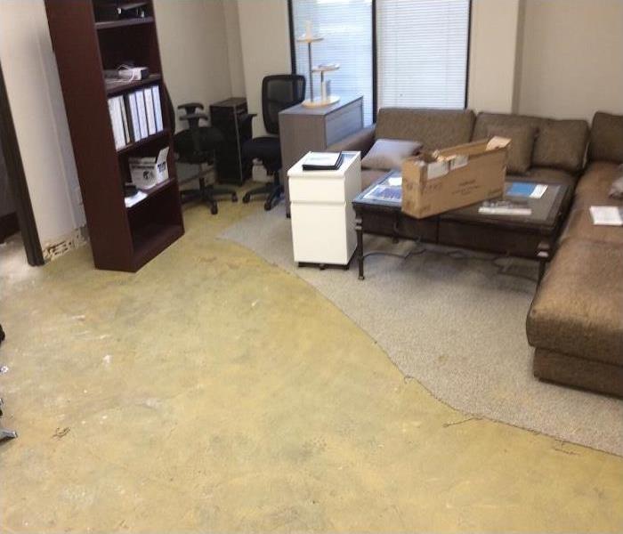 commercial business lobby damaged by flash flood